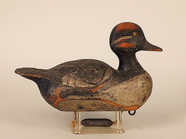 Bufflehead by Frank Buchner of Erie, Pennsylvania with anchor-style relief carving in the back. Has traditional Erie-style swing weight and a tag that reads, "Anthony P. Straub, 629 West 4th St., Erie City, PA."