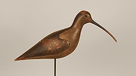Curlew by John Dilley of Quogue, Long Island, New York, ca. 1890. A rare species with deeply cut wings in well worn original paint with a replaced bill. A classic Long Island shorebird by one of its most acclaimed makers.