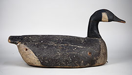 Early Canada goose by an unknown Crisfield, Maryland decoy maker, ca. 1920. Carved wing delineation and carved eyes. E.C. Dize is painted on the bottom. Wonderful piece of Eastern Shore folk art.