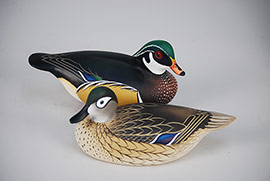 Pair of miniature wood ducks by Charlie Joiner of Chestertown, Maryland, signed and dated 1976.