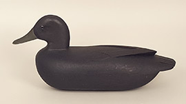 Black duck by an unknown Delaware River maker, ca. 1940s. "F.E.D" is scratched into the pad weight